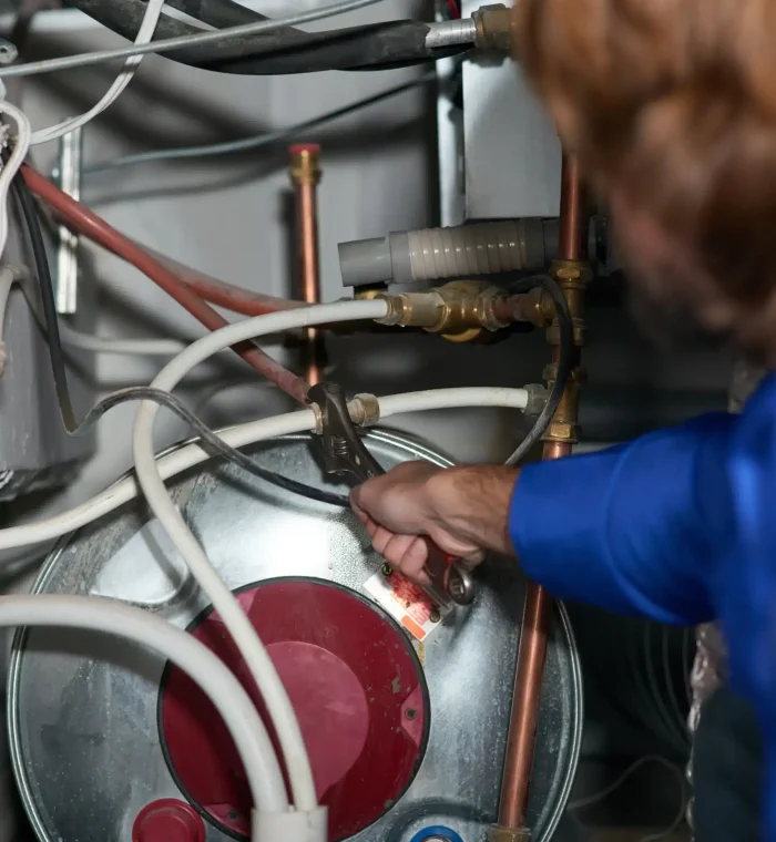 cropped-shot-of-a-handyman-repairing-a-pipe-on-a-w-2023-11-27-04-57-19-utc